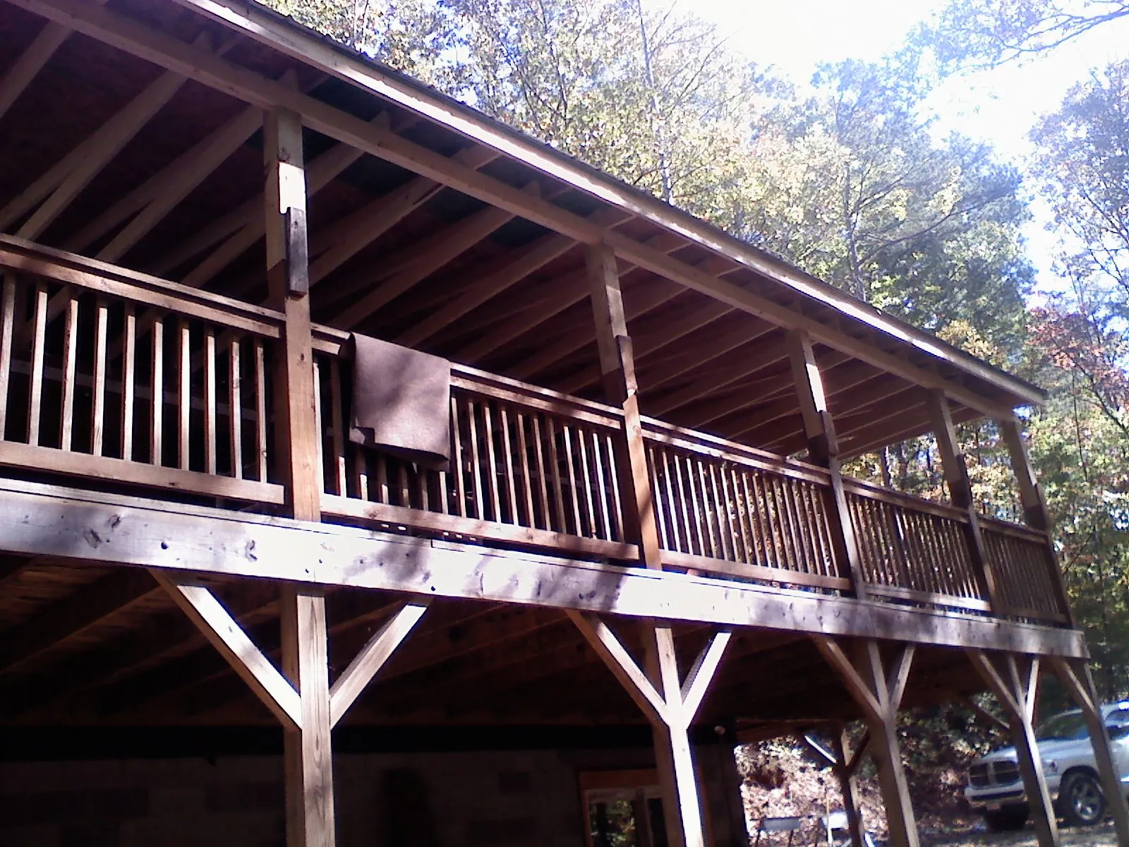 Timber framing under a new elevated porch and deck — Roof Leak Repair in Newbury by Roofing Brothers